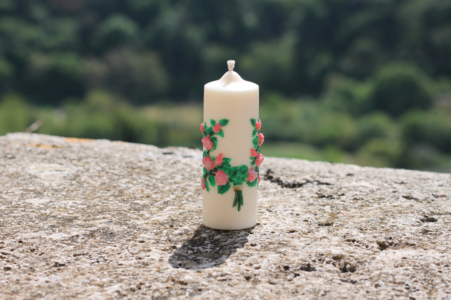 Candela con fiori